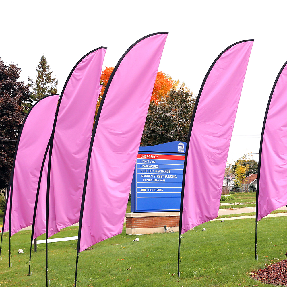 Series of pink flags at Beaver Dam Community Hospital representing breast cancer awareness