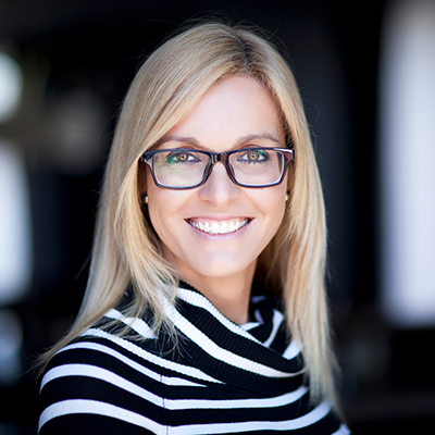 Portrait of a blonde woman with glasses. Beaver Dam Community Hospital ophthalmology